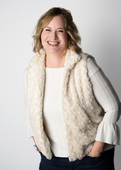 Happy woman laughing during headshot session