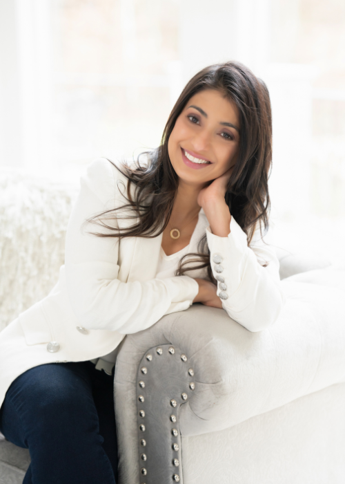 Indian desi woman in all white suit jacket headshot modern